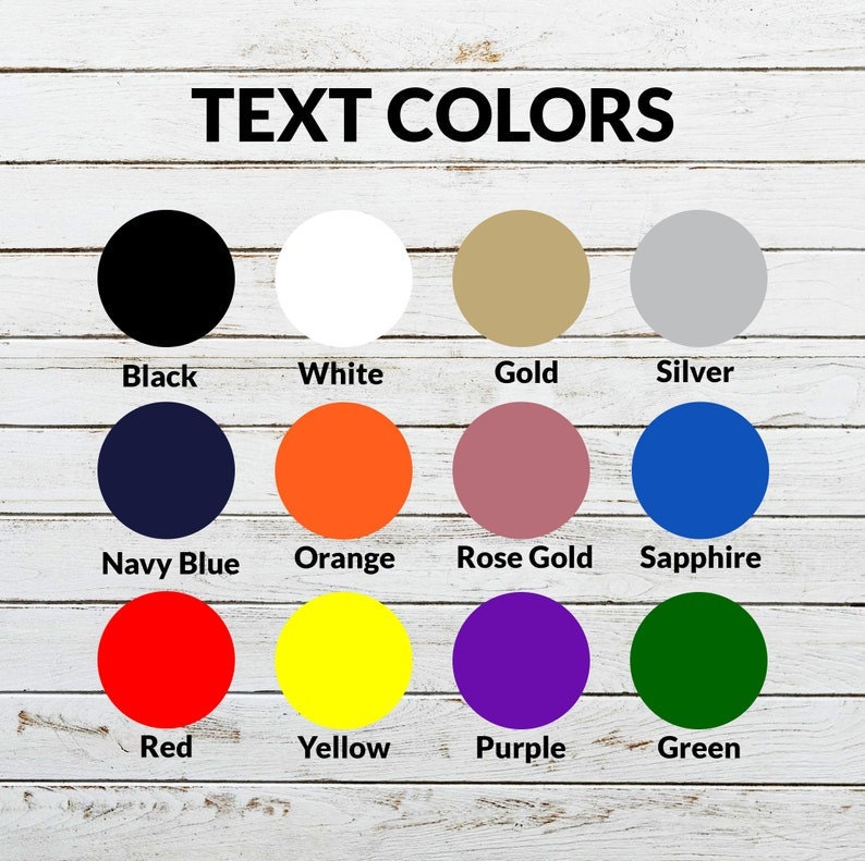 Op de afbeelding: Een kleurenkaart met de titel TEXT COLORS met twaalf cirkelvormige stalen in zwart, wit, goud, zilver, marineblauw, oranje, ros&eacute;goud, saffier, rood, geel, paars en groen, elk gelabeld met de bijbehorende kleurnaam in zwarte tekst.