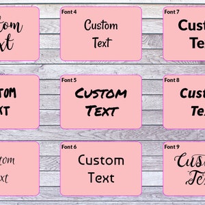 May include: A grid of nine pink rectangular labels, each featuring the words Custom Text in a unique black typeface. The labels are numbered from Font 1 to Font 9, showcasing a variety of script, serif, and sans-serif lettering styles for customization.