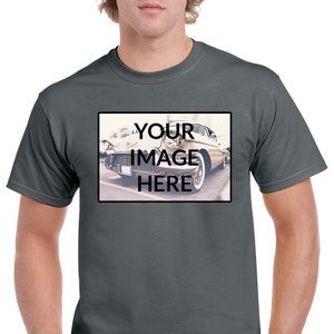 May include: Dark gray t-shirt with a rectangular graphic on the front. The graphic features a vintage car and the text "YOUR IMAGE HERE" in a bold, sans-serif font. The shirt is a classic crew neck style.