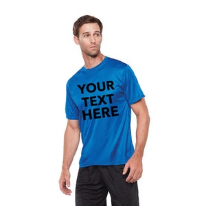 May include: A royal blue performance t-shirt with black text that reads "YOUR TEXT HERE".