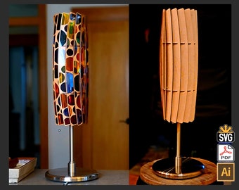 May include: Two table lamps with a modern design. The lamp on the left has a colorful, geometric shade. The lamp on the right has a wooden shade with a natural finish.