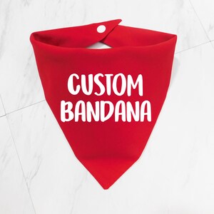 May include: Red bandana with white text that says "CUSTOM BANDANA".
