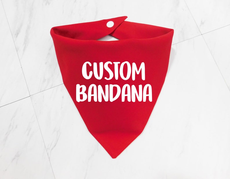 May include: Red bandana with white text that says "CUSTOM BANDANA".