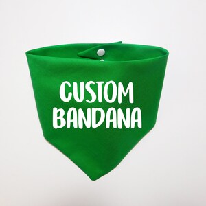 May include: A green bandana with white text that says "CUSTOM BANDANA".