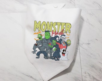 May include: White fabric tote bag with a colorful graphic of monsters. The text "Monster Mash" is printed in yellow and green letters.