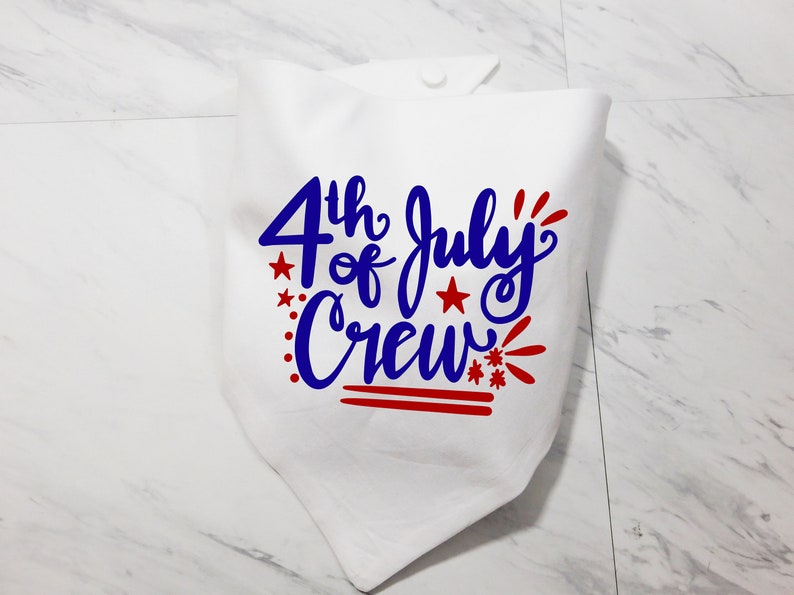 May include: White fabric bandana with the text "4th of July Crew" in blue and red lettering. The text is in a handwritten style with red stars and fireworks.