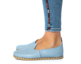 light blue slip ons