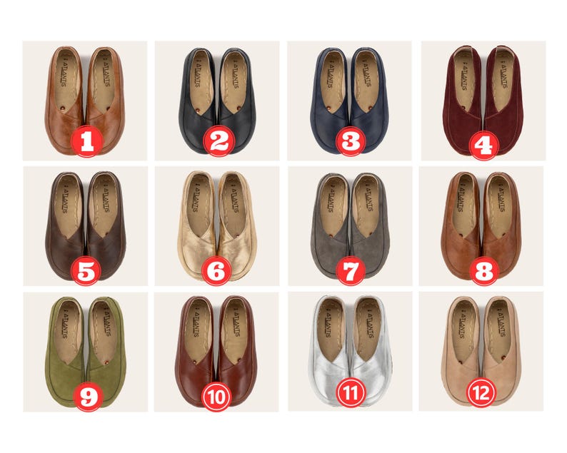 May include: A collection of twelve pairs of leather ballet flats in various colors, including brown, black, navy, burgundy, dark brown, gold, gray, light brown, olive green, reddish-brown, silver, and beige. Each pair is numbered and features the brand name "ATLANTIS".