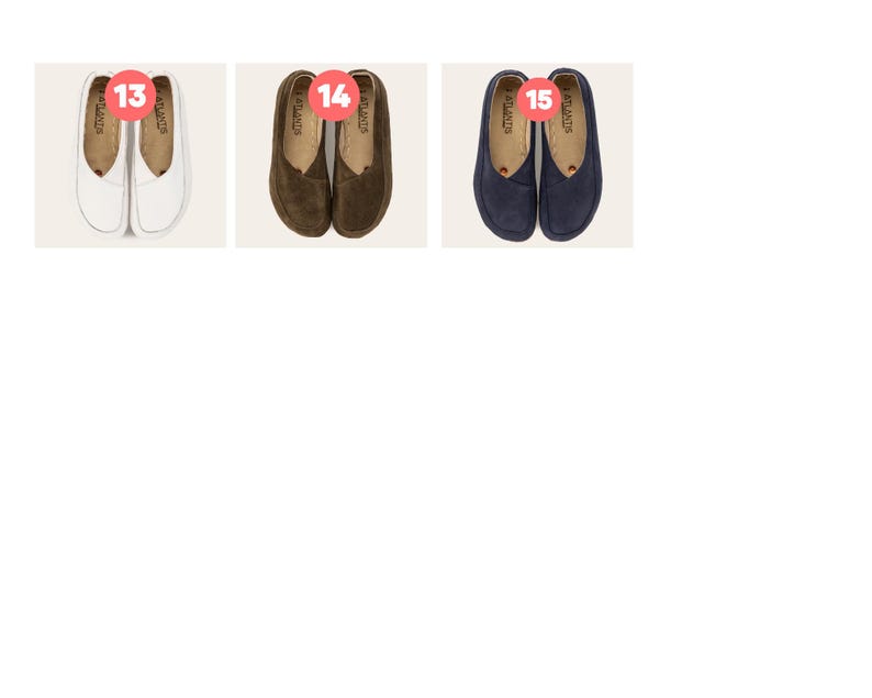 May include: Three pairs of slip-on shoes are displayed. The first pair is white, the second is brown, and the third is navy blue. Each pair has a rounded toe and a small red heart detail. The brand name "ATLANTIS" is visible on each shoe.
