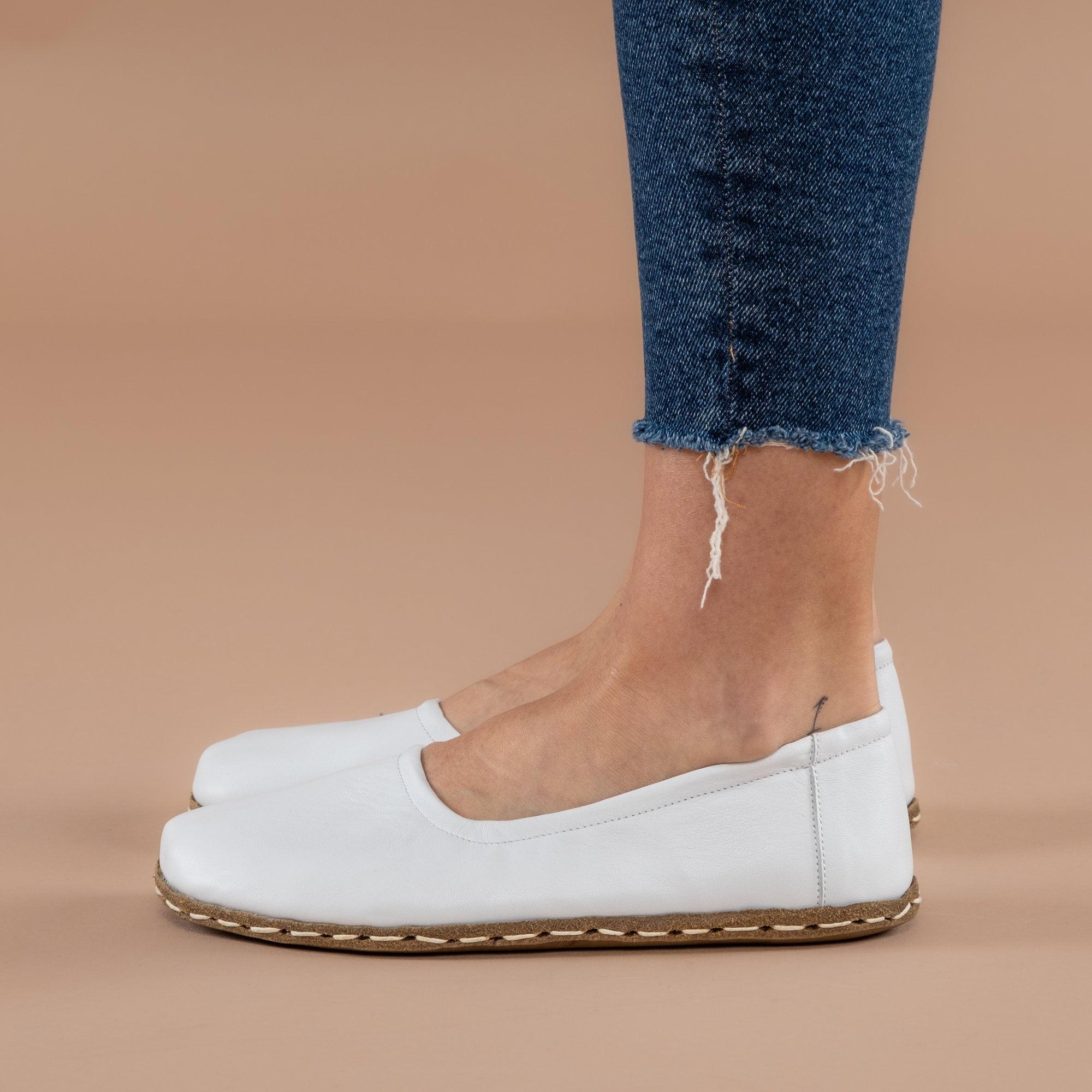 White flat slip on shoes sale