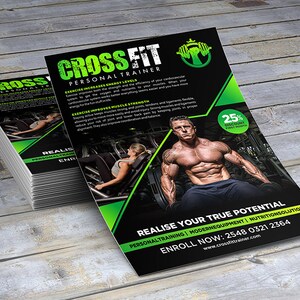 May include: A black and green flyer advertising a personal trainer service called "CrossFit Personal Trainer". The flyer features a muscular man lifting weights and text that highlights the benefits of exercise, including increased energy levels and muscle strength. The flyer also includes a 25% discount for the first month.