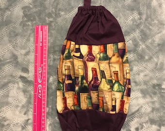 Portabolsas de plástico inspirado en el vino