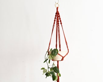 Burnt orange colored macrame plant hanger / recycled cotton / hanging flower pot / suspended planter / pot hanger/plant holder/Bruman Design