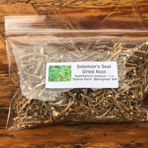 May include: A clear plastic bag filled with dried Solomon's Seal root. The label reads "Solomon's Seal Dried Root, Maianthemum stellatum 1 oz, Tellima Farm Bellingham WA".