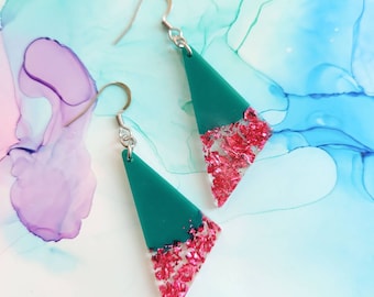 Handmade emerald green triangle resin earrings and encased pink foil flakes