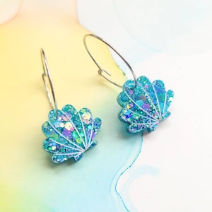 Handmade blue green glitter resin sea shell charms on surgical steel hoop earrings