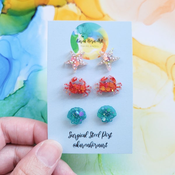 Handmade seaside 3 pack glitter resin earrings studs, crab, sea shell and sea star