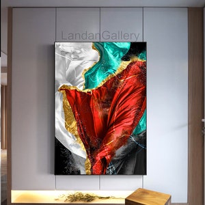 Può includere: Stampa d'arte astratta con un tessuto rosso, bianco e turchese con accenti dorati. Il tessuto è fluido e dinamico, creando un senso di movimento. Lo sfondo è nero.