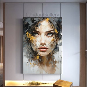 May include: A painting of a woman's face with a soft, abstract style. The woman has long dark hair and green eyes. The background is a mix of gray and yellow.