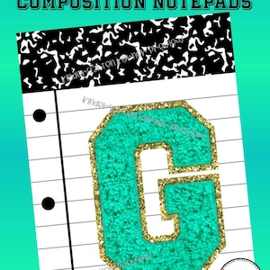 May include: A composition notepad with a teal varsity letter "G" with gold glitter trim. The notepad has a black and white marbled design at the top and the text "TEAL VARSITY LETTERS COMPOSITION NOTEPADS".