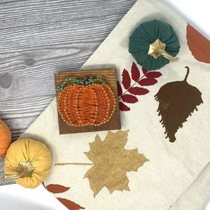 Pumpkin String Art | fall seasonal home decor, handmade fall decorations, pumpkin shelf sitter decor