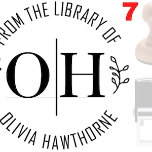 May include: Black and white custom self-inking stamp with the text "From the Library of Olivia Hawthorne" and the initials "OH" with a floral design. The stamp is mounted on a wooden handle.