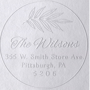 May include: White round return address label with a stylized palm leaf design. The text reads "The Wilsons", "355 W. Smith Store Ave.", "Pittsburgh, PA", and "5206".