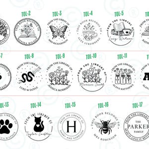 May include: A collection of seventeen round book stamps with various designs. The stamps include images of a tree, flowers, a butterfly, a teacup, books, a paw print, a cat, a bee, and initials. Each stamp has a name.