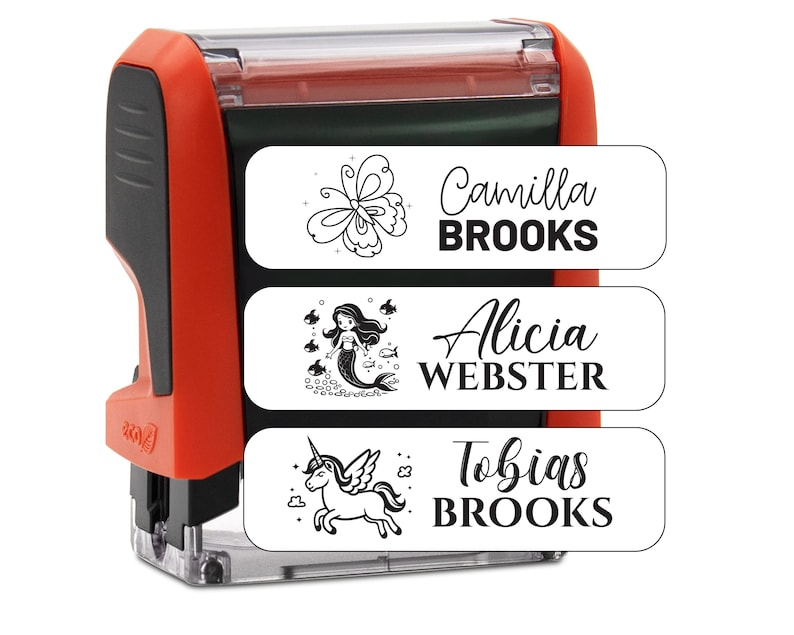 May include: Red self-inking stamp with three interchangeable stamp pads. The stamp pads feature a butterfly, a mermaid, and a unicorn with the names "Camilla BROOKS", "Alicia WEBSTER", and "Tobias BROOKS".