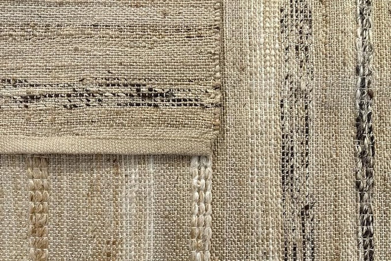 Close-up of the handwoven texture and natural tones of an eco-friendly jute rug.