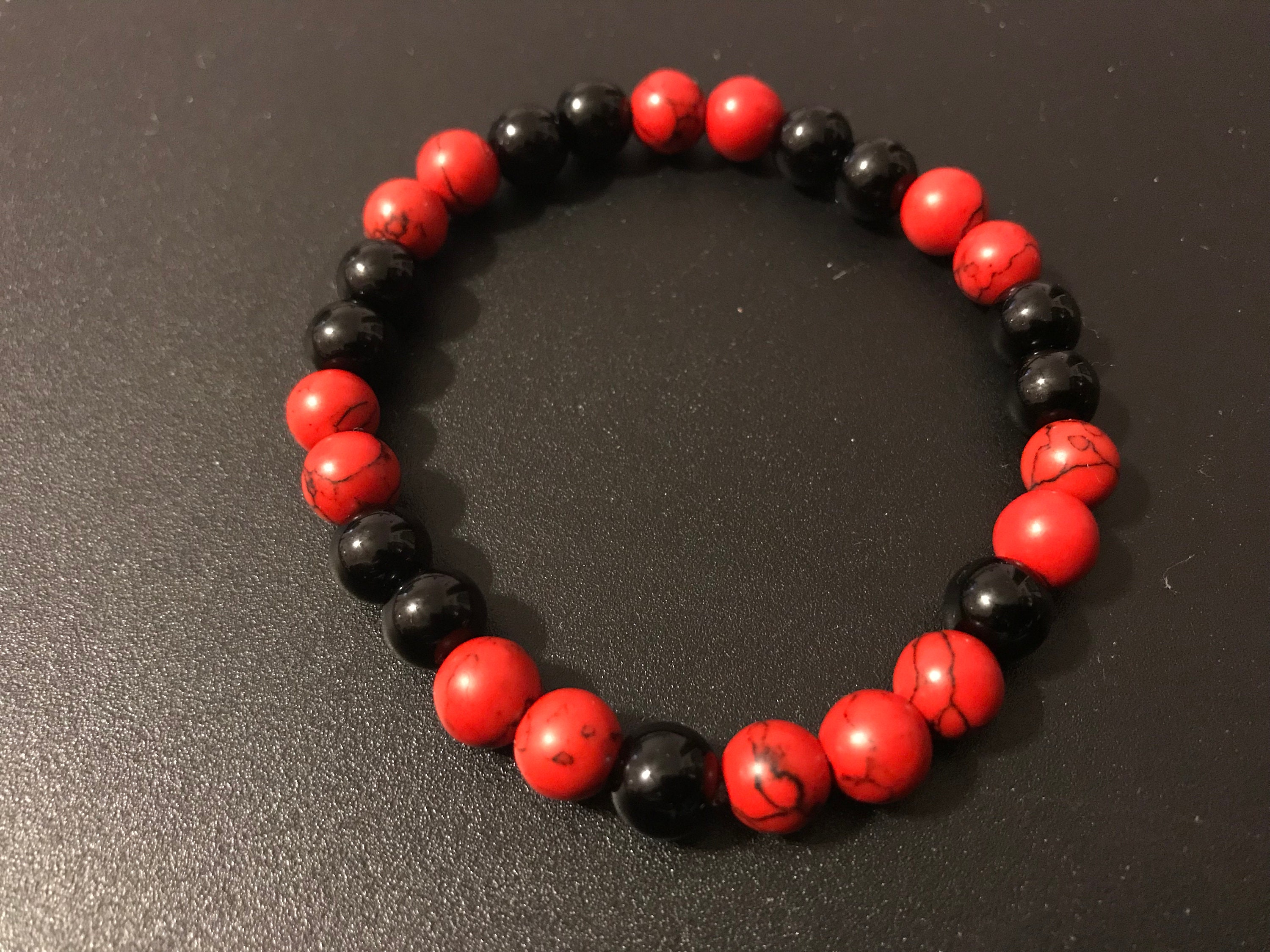 Red and black beaded best sale bracelet