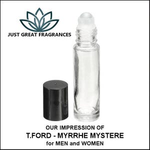 May include: A clear glass roll-on bottle with a black cap, next to the bottle. The bottle has a white rollerball applicator. The text reads "JUST GREAT FRAGRANCES" and "OUR IMPRESSION OF T.FORD - MYRRHE MYSTERE for MEN and WOMEN."
