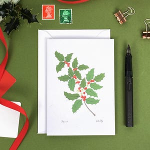 Tarjeta de felicitación floral en blanco tamaño A6 / Flores del mes de nacimiento / Tarjetas con ilustraciones artísticas / Flor de acebo / Cumpleaños de diciembre / Tarjeta navideña / Linda Fox