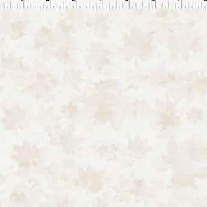 May include: Off-white fabric with a repeating pattern of light brown maple leaves. The leaves are slightly blurred, creating a soft, watercolor effect. The fabric is suitable for various craft and sewing projects.