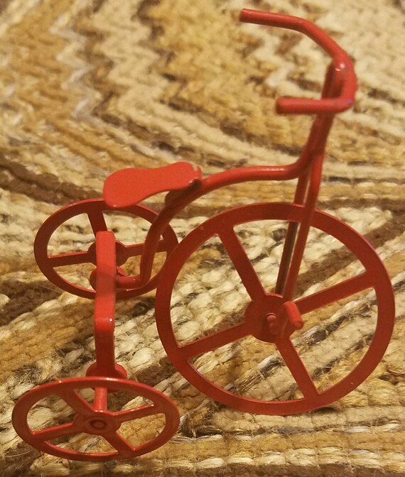 red metal trike