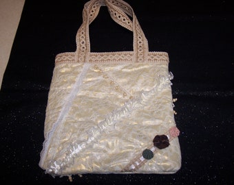 Elegante borsa da gala in pizzo trapuntato