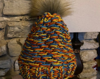 Child’s Multicolored Earth-tone Beanie with Light Brown Pom-pom