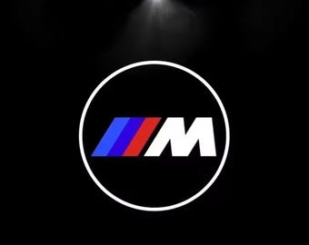 Luces de charco con proyector de logotipo LED en las puertas de BMW