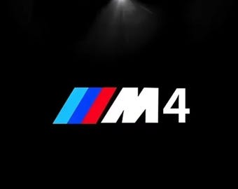 Luces de charco con proyector de logotipo LED en las puertas de BMW