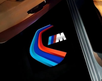 Luces de charco con proyector de logotipo LED en las puertas de BMW