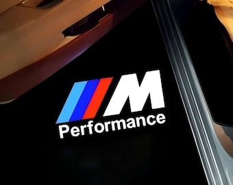 Luces de charco con proyector de logotipo LED en las puertas de BMW