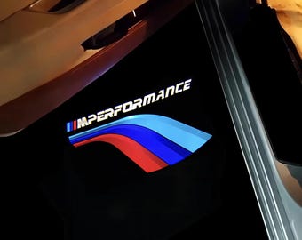 Luces de charco con proyector de logotipo LED en las puertas de BMW