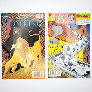 May include: Two comic books, one featuring The Lion King and the other featuring 101 Dalmatians. Both comics are from Marvel Comics.