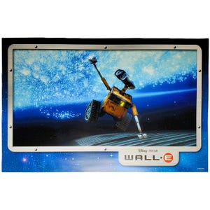 May include: A rectangular wall art print featuring the character WALL-E in space against a blue starry background. The image is framed by a metallic border with rivets and includes the Disney Pixar WALL-E logo in the bottom right corner.