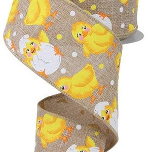 May include: A 2.5 inch wide burlap ribbon with a yellow chick and egg design. The ribbon is brown with white polka dots and features yellow chicks hatching from eggs and walking.