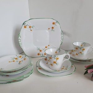 Art Deco Yellow Flower Melba Bone China Set - Cake Plate, 2 Teacups, 5 Saucers, 5 Square Side Plates