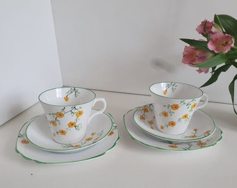 Art Deco Yellow Flower Melba Bone China Trio - Set of 2 Teacups, Saucers, Square Side Plates