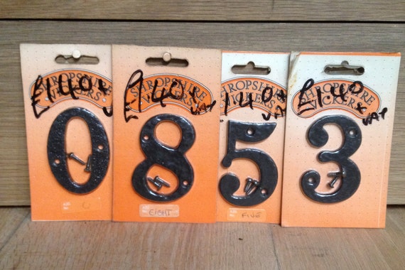 Black metal door number 3
