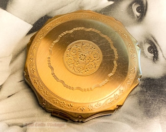 Polvos compactos vintage tono dorado de Kigu: Espejo de maquillaje-1y