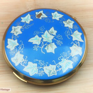 Espejo compacto vintage para maquillaje y polvos con hojas azules y doradas de Kigu, 204, espejo compacto vintage, espejo de mano, tocador vintage.